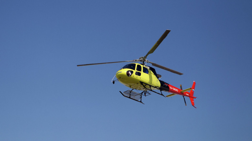 Tıxacdan bezən kişi helikopterlə mağazaya uçdu
